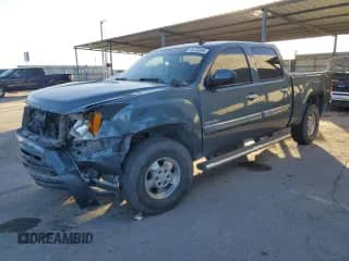 2012 GMC Sierra 1500 Denali with VIN 3GTP1XE28CG125701, listed as a Copart auction lot 86206384 with 116,731 mi miles and Salvage title. Bid and sale history available at DreamBid. Image 1.