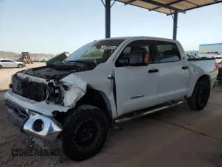 2010 Toyota Tundra с VIN 5TFDW5F12AX154263, выставлен на аукционе Copart как лот 68143615 с пробегом 169 634 миль миль и Списание • Salvage title. История ставок и продаж доступна на DreamBid. Изображение 1.