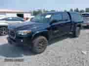 2018 Toyota Tacoma SR5 z VIN 5TFSZ5AN2JX151257, wystawiony jako IAAI lot #42895721 z przebiegiem 157 990 mil mil oraz . Historia ofert i sprzedaży dostępna na DreamBid. Obrazek 2.