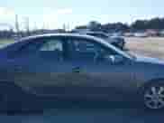 2005 Toyota Camry XLE with VIN 4T1BF30K45U615723, listed as a IAAI auction lot 43091390 with 101,315 mi miles and . Bid and sale history available at DreamBid. Image 14.