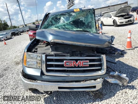 2012 GMC Sierra 1500 SLE with VIN 1GTR2VE72CZ252014, listed as a Copart auction lot 71216895 with Not provided miles and Salvage title. Bid and sale history available at DreamBid. Image 5.