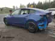 2024 Tesla Model Y Long Range with VIN 7SAYGDEE4RF986774, listed as a Copart auction lot 89833295 with 3,503 mi miles and Salvage title. Bid and sale history available at DreamBid. Image 2.