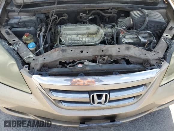 2006 Honda Odyssey EX z VIN 5FNRL38446B439803, wystawiony jako Copart lot #58628095 z przebiegiem 198 483 mil mil oraz Szkoda całkowita • Salvage title. Historia ofert i sprzedaży dostępna na DreamBid. Obrazek 12.