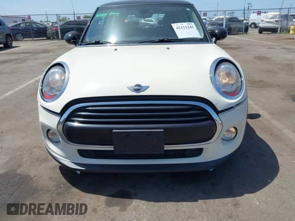 2017 MINI Hardtop Cooper with VIN WMWXP5C39H2D71459, listed as a IAAI auction lot 42111245 with 97,759 mi miles and . Bid and sale history available at DreamBid. Image 12.