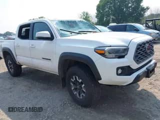 2023 Toyota Tacoma SR z VIN 3TMCZ5ANXPM638287, wystawiony jako IAAI lot #42867934 z przebiegiem 19 786 mil mil oraz . Historia ofert i sprzedaży dostępna na DreamBid. Obrazek 1.