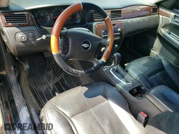 2012 Chevrolet Impala LTZ с VIN 2G1WC5E36C1137575, выставлен на аукционе Copart как лот 67644075 с пробегом 218 978 миль миль и Списание • Salvage title. История ставок и продаж доступна на DreamBid. Изображение 8.