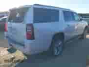 2019 Chevrolet Suburban Premier with VIN 1GNSCJKC0KR293658, listed as a IAAI auction lot 40563834 with 153,619 mi miles and . Bid and sale history available at DreamBid. Image 4.