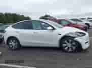 2022 Tesla Model Y Long Range z VIN 7SAYGDEE6NF317707, wystawiony jako IAAI lot #43186532 z przebiegiem 45 306 mil mil oraz . Historia ofert i sprzedaży dostępna na DreamBid. Obrazek 14.