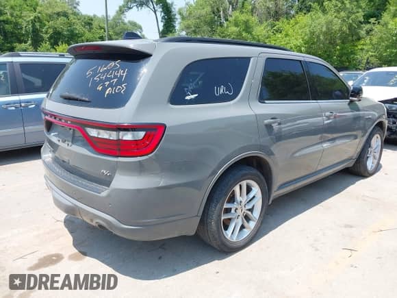2023 Dodge Durango R/T Plus with VIN 1C4SDJCT1PC555850, listed as a IAAI auction lot 42465738 with 52,627 mi miles and . Bid and sale history available at DreamBid. Image 4.