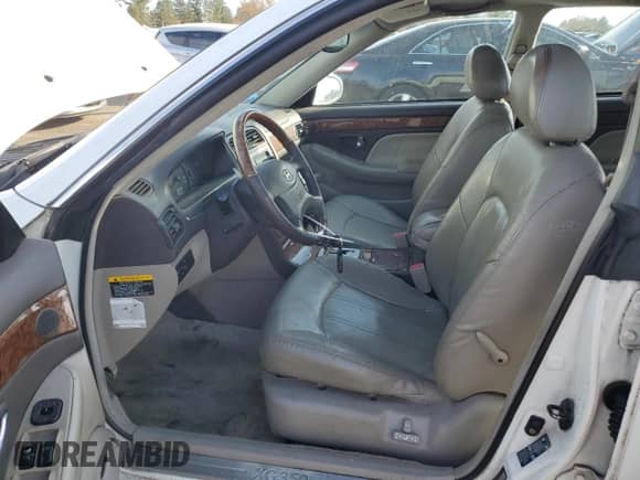 2005 Hyundai XG с VIN KMHFU45E85A392619, выставлен на аукционе Copart как лот 78087664 с пробегом 71 256 миль миль и Списание • Salvage title. История ставок и продаж доступна на DreamBid. Изображение 7.