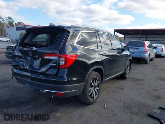 2021 Honda Pilot Touring 7-Passenger с VIN 5FNYF5H68MB000651, выставлен на аукционе IAAI как лот 41541365 с пробегом 49 308 миль миль и . История ставок и продаж доступна на DreamBid. Изображение 4.