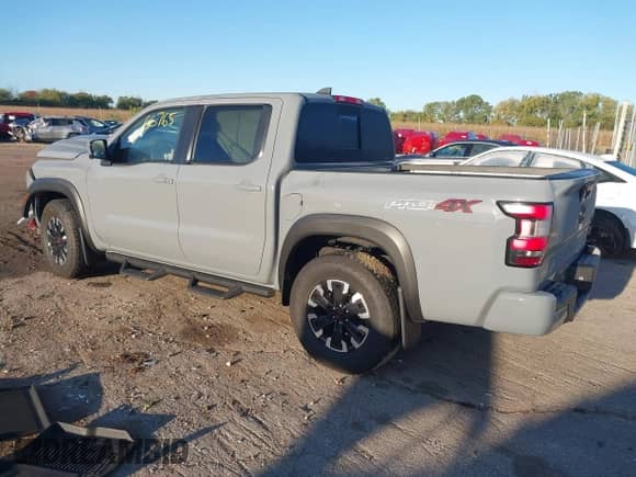 2023 Nissan Frontier Pro-4X with VIN 1N6ED1EKXPN670644, listed as a IAAI auction lot 43366765 with 13,230 mi miles and . Bid and sale history available at DreamBid. Image 3.