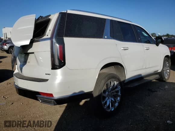 2022 Cadillac Escalade Premium Luxury с VIN 1GYS4BKL6NR153415, выставлен на аукционе Copart как лот 73532174 с пробегом 70 148 миль миль и Списание • Salvage title. История ставок и продаж доступна на DreamBid. Изображение 3.