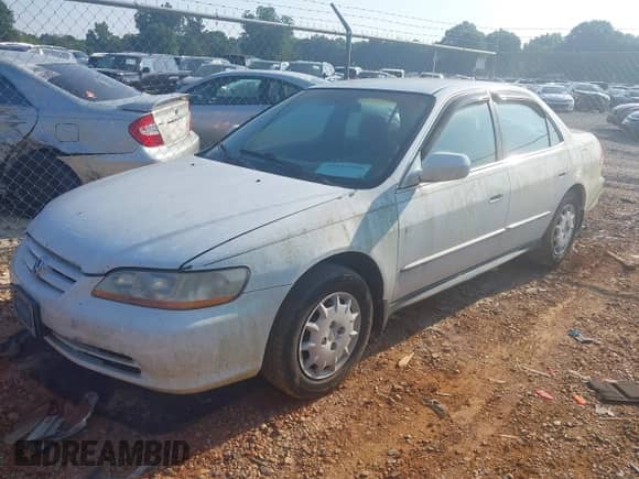 2001 Honda Accord LX with VIN 1HGCG56411A007343, listed as a IAAI auction lot 42659586 with 343,593 mi miles and . Bid and sale history available at DreamBid. Image 2.