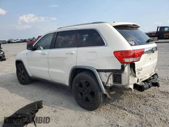 2011 Jeep Grand Cherokee Laredo с VIN 1J4RR4GG2BC617838, выставлен на аукционе Copart как лот 72069035 с пробегом 186 984 миль миль и Списание • Salvage title. История ставок и продаж доступна на DreamBid. Изображение 2.