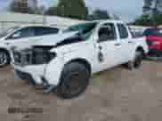 2017 Nissan Frontier SV with VIN 1N6DD0EV2HN765247, listed as a IAAI auction lot 41017764 with 141,942 mi miles and . Bid and sale history available at DreamBid. Image 2.