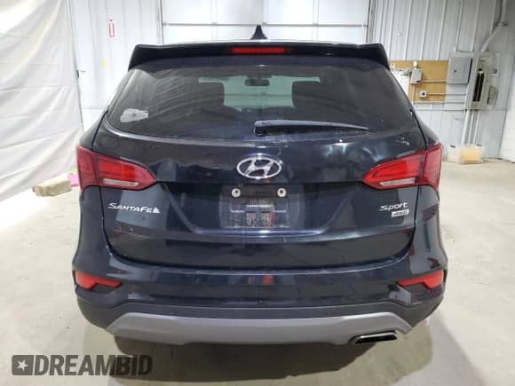 2017 Hyundai Santa Fe 2.4L z VIN 5XYZTDLB8HG440279, wystawiony jako Copart lot #84611545 z przebiegiem 100 644 mil mil oraz Szkoda całkowita • Salvage title. Historia ofert i sprzedaży dostępna na DreamBid. Obrazek 6.