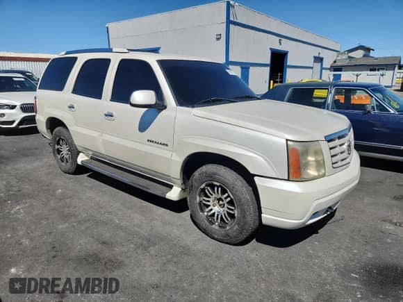 2002 Cadillac Escalade with VIN 1GYEK63N92R111696, listed as a Copart auction lot 69327295 with 257,576 mi miles and Salvage title. Bid and sale history available at DreamBid. Image 4.