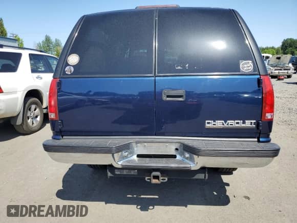 1999 Chevrolet Suburban с VIN 3GNGK26J4XG221019, выставлен на аукционе Copart как лот 59517325 с пробегом 112 023 миль миль и Чистый • Clean title. История ставок и продаж доступна на DreamBid. Изображение 6.