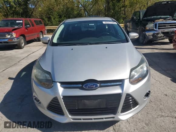 2014 Ford Focus Titanium with VIN 1FADP3N22EL209180, listed as a Copart auction lot 82577545 with 71,107 mi miles and Clean title. Bid and sale history available at DreamBid. Image 5.