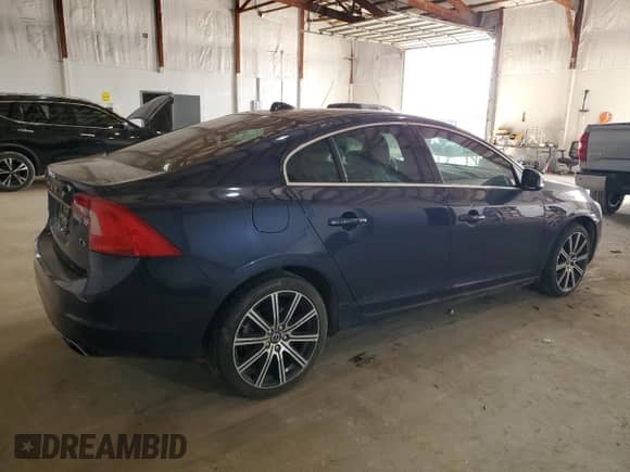 2015 Volvo S60 T6 Drive-E with VIN YV149MFK2F1341338, listed as a Copart auction lot 46083085 with 97,766 mi miles and Salvage title. Bid and sale history available at DreamBid. Image 3.