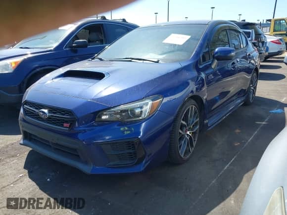 2020 Subaru WRX STI with VIN JF1VA2E61L9802526, listed as a IAAI auction lot 43306395 with 79,114 mi miles and . Bid and sale history available at DreamBid. Image 2.
