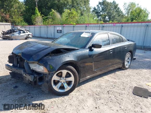 2012 Dodge Charger SE with VIN 2C3CDXBG3CH301306, listed as a IAAI auction lot 43054623 with 106,375 mi miles and . Bid and sale history available at DreamBid. Image 2.