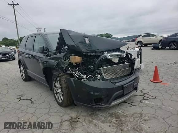 2013 Dodge Journey R/T z VIN 3C4PDCEG4DT642725, wystawiony jako Copart lot #61438805 z przebiegiem 158 415 mil mil oraz Szkoda całkowita • Salvage title. Historia ofert i sprzedaży dostępna na DreamBid. Obrazek 13.