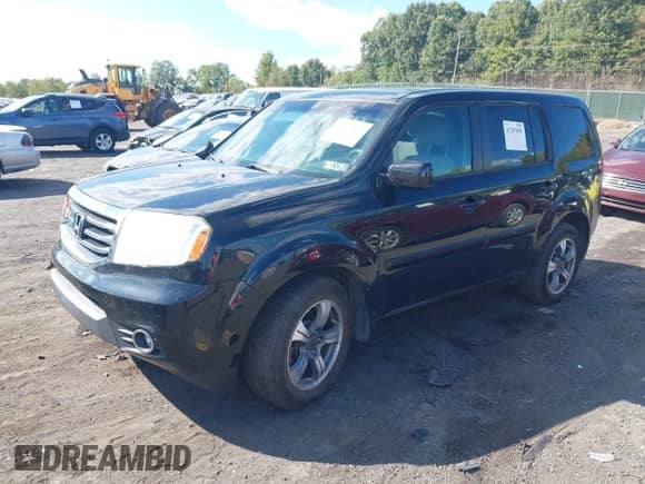 2015 Honda Pilot SE with VIN 5FNYF4H33FB079164, listed as a IAAI auction lot 43207895 with 148,817 mi miles and . Bid and sale history available at DreamBid. Image 2.