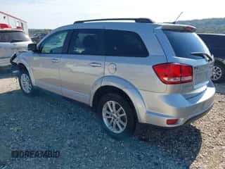 2014 Dodge Journey SXT with VIN 3C4PDCBB3ET112742, listed as a IAAI auction lot 43420445 with 113,538 mi miles and . Bid and sale history available at DreamBid. Image 3.