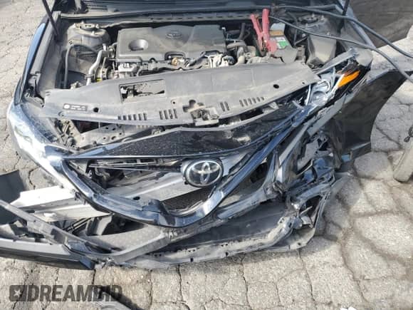 2019 Toyota Camry SE z VIN 4T1B11HK3KU166036, wystawiony jako Copart lot #83827125 z przebiegiem 131 811 mil mil oraz Szkoda całkowita • Salvage title. Historia ofert i sprzedaży dostępna na DreamBid. Obrazek 11.