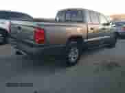2007 Dodge Dakota SLT z VIN 1D7HE48N87S107409, wystawiony jako Copart lot #84056444 z przebiegiem 226 839 mil mil oraz Szkoda całkowita • Salvage title. Historia ofert i sprzedaży dostępna na DreamBid. Obrazek 3.