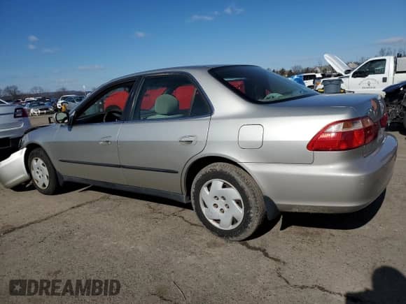 1999 Honda Accord LX with VIN 1HGCG1646XA013608, listed as a Copart auction lot 42612705 with 160,517 mi miles and Salvage title. Bid and sale history available at DreamBid. Image 2.