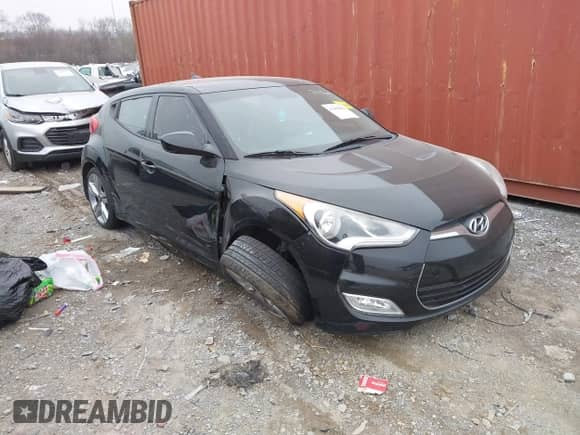 2014 Hyundai Veloster with VIN KMHTC6AD6EU182596, listed as a IAAI auction lot 41498382 with 99,376 mi miles and . Bid and sale history available at DreamBid. Image 13.