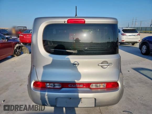 2010 Nissan Cube S Krom Edition with VIN JN8AZ2KR2AT157695, listed as a Copart auction lot 69221075 with 171,973 mi miles and Salvage title. Bid and sale history available at DreamBid. Image 6.