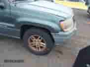 2003 Jeep Grand Cherokee Laredo with VIN 1J4GW48S23C610697, listed as a IAAI auction lot 43178617 with 227,331 mi miles and . Bid and sale history available at DreamBid. Image 6.