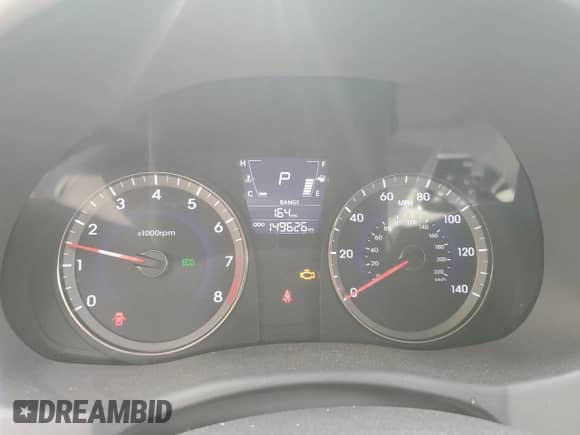 2014 Hyundai Accent SE z VIN KMHCU5AE1EU172235, wystawiony jako Copart lot #70777095 z przebiegiem 149 626 mil mil oraz Czysty tytuł • Clean title. Historia ofert i sprzedaży dostępna na DreamBid. Obrazek 9.