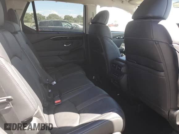 2025 Honda Pilot Touring с VIN 5FNYG2H75SB009597, выставлен на аукционе Copart как лот 80872825 с пробегом 19 231 миль миль и Списание • Salvage title. История ставок и продаж доступна на DreamBid. Изображение 11.