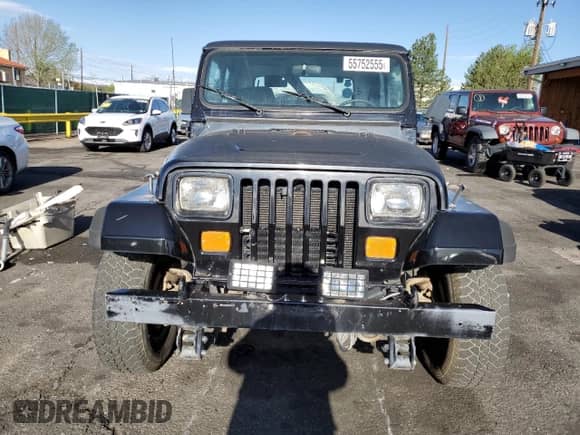 1990 Jeep Wrangler z VIN 2J4FY29T2LJ508582, wystawiony jako Copart lot #55752555 z przebiegiem 164 987 mil mil oraz Czysty tytuł • Clean title. Historia ofert i sprzedaży dostępna na DreamBid. Obrazek 5.