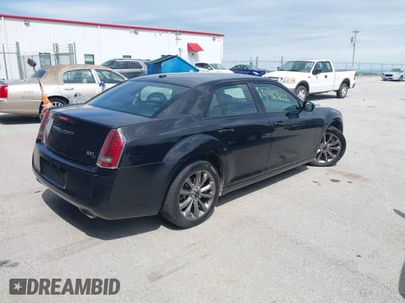 2014 Chrysler 300 S with VIN 2C3CCAGG1EH229243, listed as a IAAI auction lot 42867694 with 171,027 mi miles and . Bid and sale history available at DreamBid. Image 4.