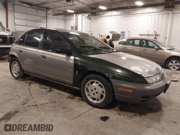 1997 Saturn SL with VIN 1G8ZH5280VZ172929, listed as a IAAI auction lot 41273214 with 134,972 mi miles and . Bid and sale history available at DreamBid. Image 1.