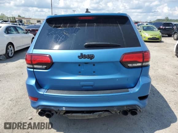 2018 Jeep Grand Cherokee Trackhawk z VIN 1C4RJFN97JC335271, wystawiony jako Copart lot #62872195 z przebiegiem Nie podano mil oraz Szkoda całkowita • Salvage title. Historia ofert i sprzedaży dostępna na DreamBid. Obrazek 6.