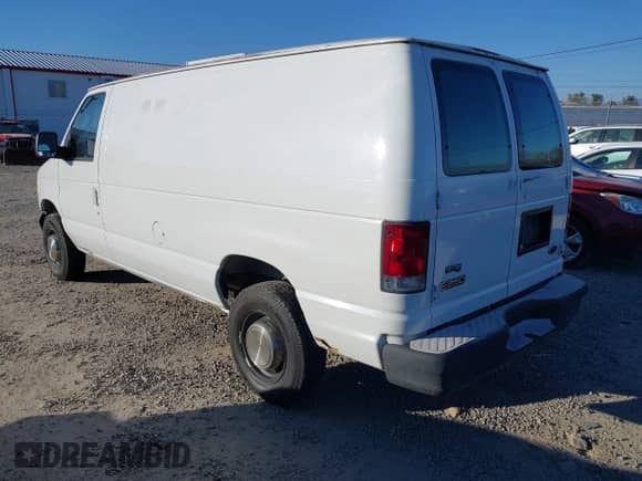 2003 Ford Econoline Cargo with VIN 1FTNE24L23HA98641, listed as a IAAI auction lot 41285948 with 257,510 mi miles and . Bid and sale history available at DreamBid. Image 3.