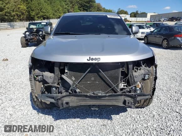 2016 Jeep Grand Cherokee High Altitude with VIN 1C4RJECG8GC351872, listed as a Copart auction lot 75978654 with 133,888 mi miles and Salvage title. Bid and sale history available at DreamBid. Image 5.