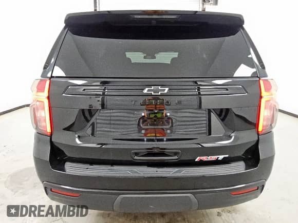 2023 Chevrolet Tahoe RST с VIN 1GNSCRKD0PR490599, выставлен на аукционе Copart как лот 63528765 с пробегом 77 665 миль миль и Чистый • Clean title. История ставок и продаж доступна на DreamBid. Изображение 6.