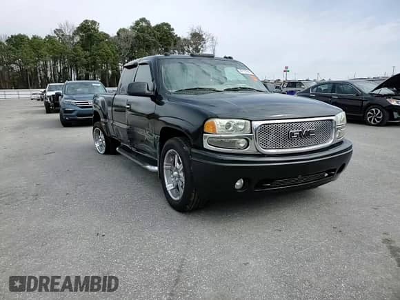 2002 GMC Sierra 1500 Denali z VIN 2GTFK69U221383430, wystawiony jako Copart lot #47127615 z przebiegiem 256 422 mil mil oraz Szkoda całkowita • Salvage title. Historia ofert i sprzedaży dostępna na DreamBid. Obrazek 11.