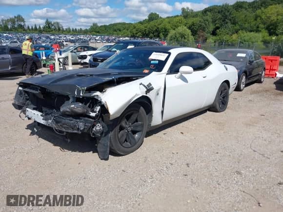 2017 Dodge Challenger SXT Plus with VIN 2C3CDZAG5HH605905, listed as a IAAI auction lot 43048856 with 58,221 mi miles and . Bid and sale history available at DreamBid. Image 2.