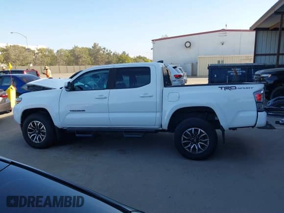 2021 Toyota Tacoma SR5 with VIN 3TMAZ5CN7MM146297, listed as a IAAI auction lot 43348248 with 46,809 mi miles and . Bid and sale history available at DreamBid. Image 15.