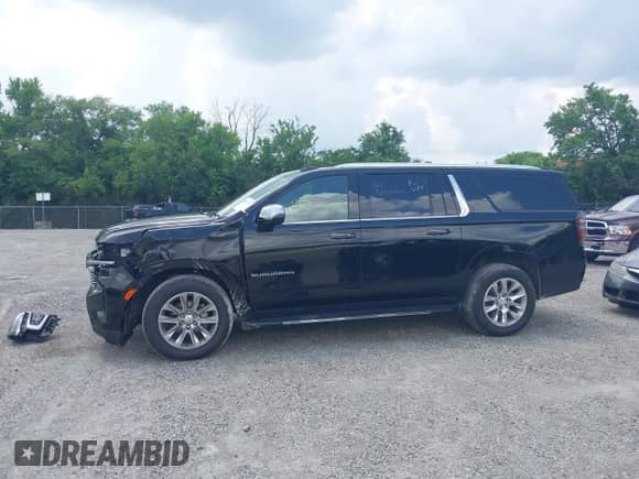 2023 Chevrolet Suburban Premier z VIN 1GNSKFKDXPR385697, wystawiony jako IAAI lot #42601771 z przebiegiem 75 487 mil mil oraz . Historia ofert i sprzedaży dostępna na DreamBid. Obrazek 15.