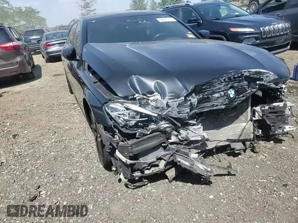 2017 BMW 7 Series 740e xDrive with VIN WBA7J2C32HG497906, listed as a Copart auction lot 68861214 with Not provided miles and Salvage title. Bid and sale history available at DreamBid. Image 11.